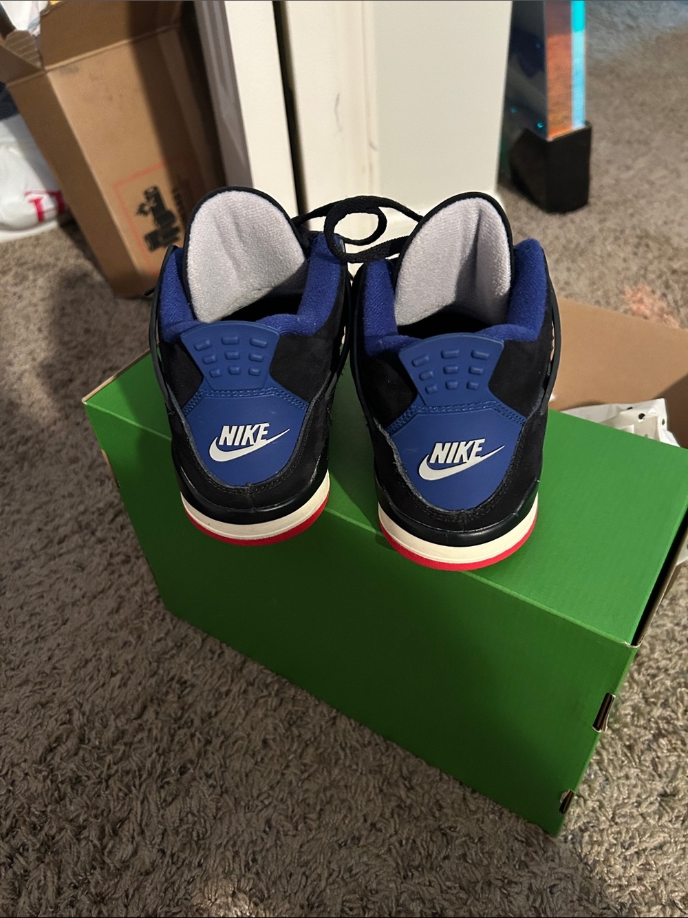 Jordan Kids Retro Black Sneakers with Blue and Red Accents - Picture 2 of 5